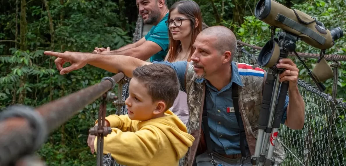 Family with kids in hanging bridges Arenal Costa Rica